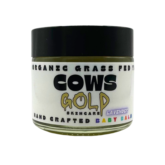 Jar of 'Cows Gold' baby balm on a white background